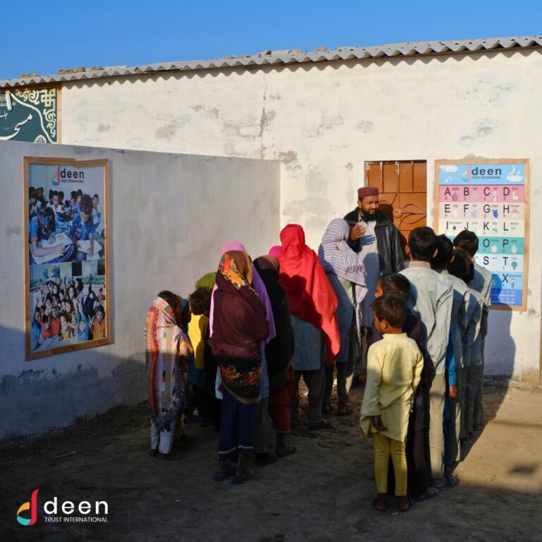 School children wait to begin their classes at Deen Trust International School for the Underprivileged